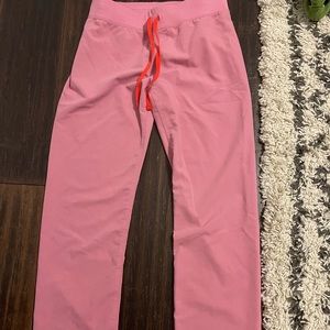 Figs -small tall pink. Tags removed and worn/washed one time.